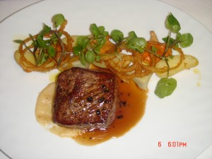 Filet of Beef with turnip puree, buttermilk cippolini onion rings, Sausalito watercress and Perigeaux sauce