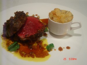 Bison with Blue Cheese Spoon Bread and Roasted Shallot Vinaigrette