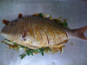 Whole Pink Snapper with ginger, lemon and parsley